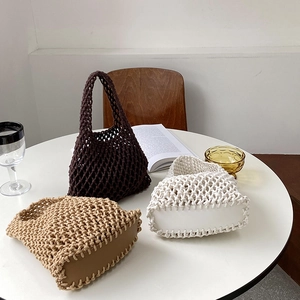 Three hand-woven cotton rope tote bags in brown, beige, and white on a clean table