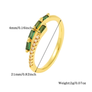 Detail of gold ring with green emerald-cut stone and size labels for jewelry design