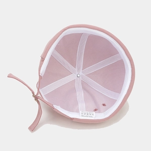 Inside view of pink cotton embroidery brimless Miki hat with adjustable strap