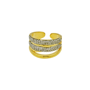 Macro detail of X-shaped two-tone layered ring with gold, silver bands and cubic zirconia