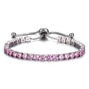 Detailed view of adjustable silver tennis bracelet with pink square-cut crystals