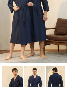Detail view of navy blue waffle texture fabric on high-quality couple bathrobes