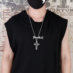 Hip hop hollow cross pendant necklace with rhinestones on a punk streetwear model