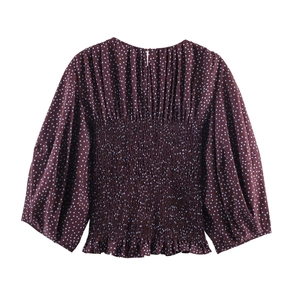 Polka dot balloon sleeve blouse in burgundy with pleated waist design on white background