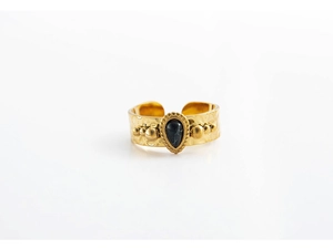 Detail of 18K gold plated ring featuring a black pear-shaped stone and beaded band accents