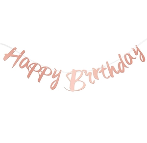 Detail of rose gold Happy Birthday banner with metallic texture for party decoration