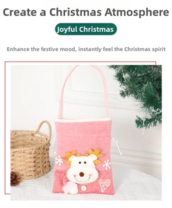 Pink Christmas gift bag featuring a 3D reindeer with sequins and velvet texture