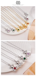 Detail of teddy bear pendants with colorful heart-shaped cubic zirconia and gold chains