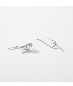 Detailed close-up of S925 silver angel wing earrings with sparkling diamond pavé accents