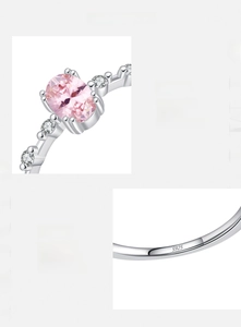 Detail view of pink crystal ring showing S925 silver hallmark and pavé cubic zirconia