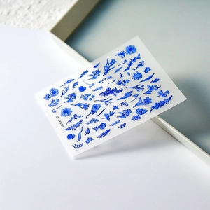Detail of 5D embossed Klein blue floral nail art sticker with textured floral patterns