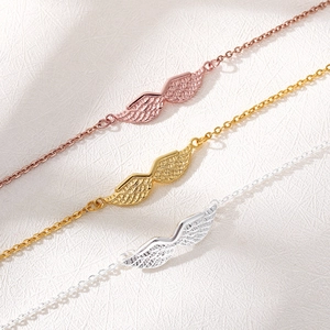Three-color angel wing charm bracelets in rose gold, gold and silver stainless steel