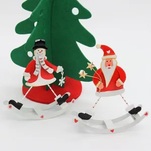 Hand-painted metal rocking Christmas ornaments featuring Santa Claus and snowman figures