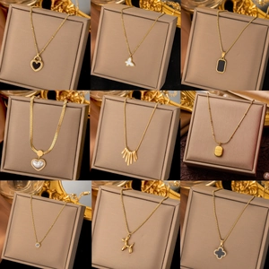 Detailed grid of gold titanium steel necklaces featuring clover and butterfly pendants