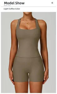 Detail of ribbed knit texture on light coffee yoga vest and high-waist shorts set