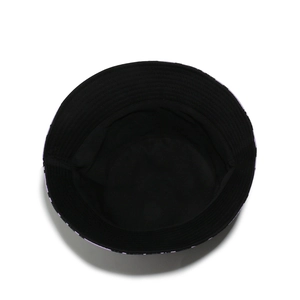 Top-down view of a leopard print bucket hat with black lining and sun protection brim