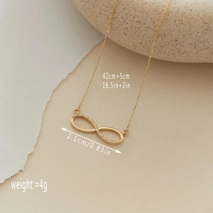 Elegant gold infinity symbol necklace with micro-pave cubic zirconia pendant for women