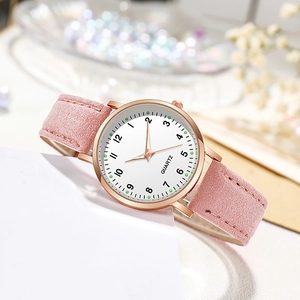 Elegant rose gold watch with pink suede strap and white dial featuring Arabic numerals