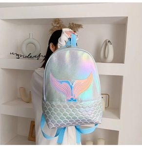 Close-up of laser mermaid backpack featuring fish tail embroidery and scale quilting