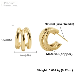 Detailed view of triple layered gold C-shape copper earrings with silver pins