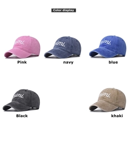 Detailed color display of washed vintage cotton baseball caps with mimi embroidery