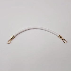 Detail of white leather handbag handle with gold swivel hooks for DIY strap replacement