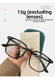 Detail showing ultra-lightweight black square eyeglass frames weighing only 13g