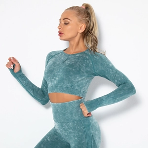 Detailed side view of seamless acid wash yoga set featuring long sleeve crop top and leggings