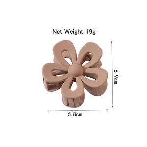 Matte pink flower hair claw clip with cutout design, 6.8cm size and 19g lightweight