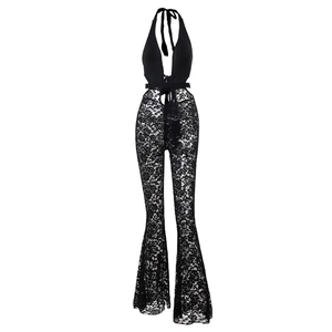 Sexy halter neck lace jumpsuit in black featuring sheer cutout and wide leg silhouette