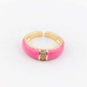 Detail of pink enamel adjustable gold ring with two rows of micro-pave zircons