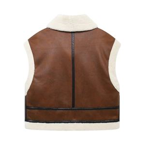 Detailed back view of vintage brown suede vest with white faux fur lining and black trim
