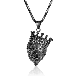 Detailed view of hip hop lion head pendant with crystal crown on black metal box chain