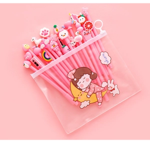 Detail of pink cartoon gel pens with cute charms and a translucent stationery bag