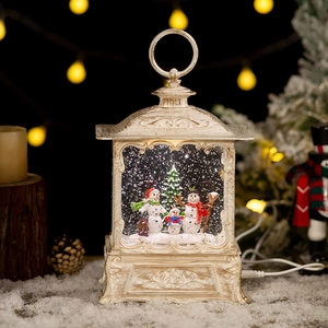 White vintage Christmas snow globe lantern with snowman family and warm festive lights