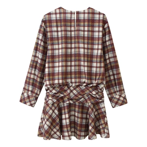 Back view of women's long sleeve plaid mini dress with twist knot detail and A-line skirt