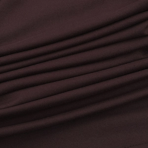 Macro shot of dark brown knit fabric showing smooth texture and soft drape detail