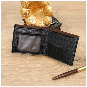 Detailed interior of black woven leather wallet with multiple card slots and ID window