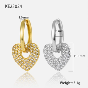 Macro detail of silver and gold heart hoop earrings with cubic zirconia, size 11mm, 3.1g
