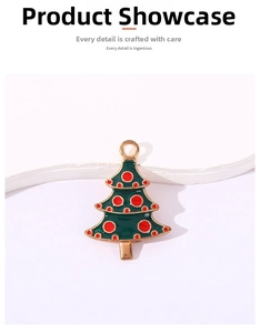 Detail of Christmas tree alloy pendant with green enamel and red dots for DIY jewelry