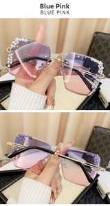 Dettaglio occhiali da sole senza montatura sfumati blu-rosa con strass e aste dorate
