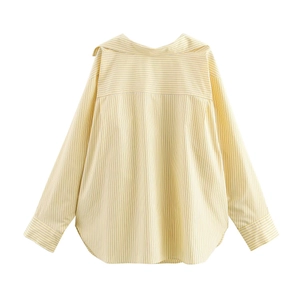 Back view of a yellow and white striped long sleeve shirt with a curved hemline detail