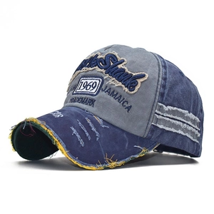 Vintage washed baseball cap in navy and grey with 1969 embroidery and distressed details