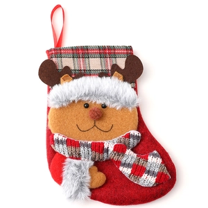 Festive red plush Christmas stocking with 3D reindeer design and plaid trim