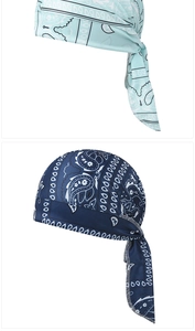 Detail of light and dark blue paisley durags showing silky fabric and long straps