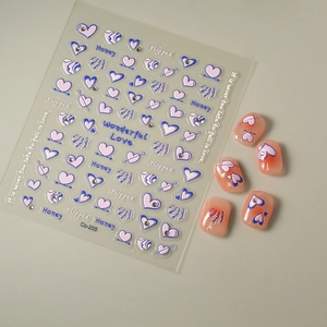 Detail of 5D embossed heart nail art stickers in purple, blue and pink hues, model Co-205