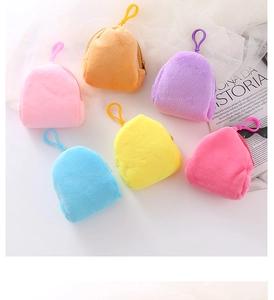 Detailed collection of six colorful plush mini backpack keychains in various soft pastel tones