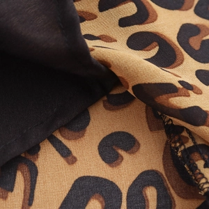 French vintage leopard print dress with V-neck and waist-defining slim fit design