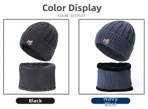 Detail view of winter knitted hat and neck warmer set with thick fleece lining in navy and black