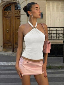 White halter top for women with gold metal ring detail and open back style